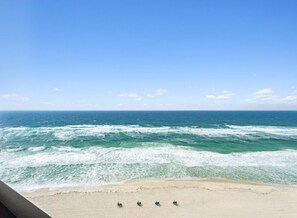 On the beach, sun loungers, beach towels