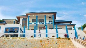 A modern building with the name "Whyte View Lodge" prominently displayed. - Whyte View Lodge (Sekondi-Takoradi)