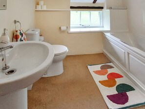 A bathroom with a sink, toilet, and bathtub. - 2 bedroom accommodation in Chillaton, near Tavistock (Chillaton, near Tavistock)