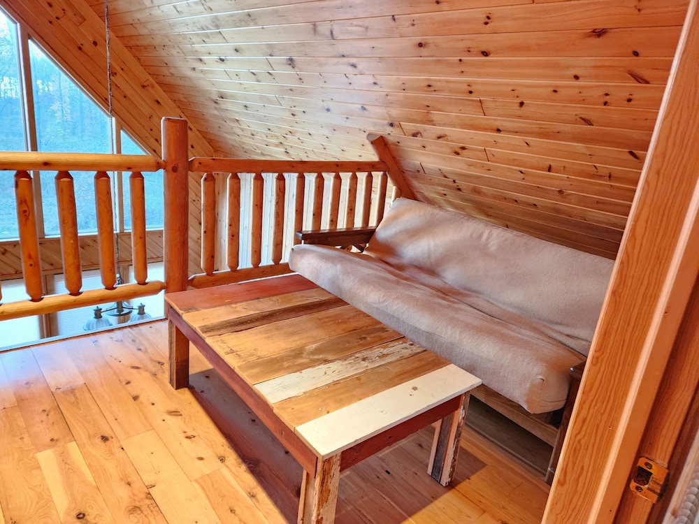 Beautiful, modern log cabin on a great swimming and fishing lake with
