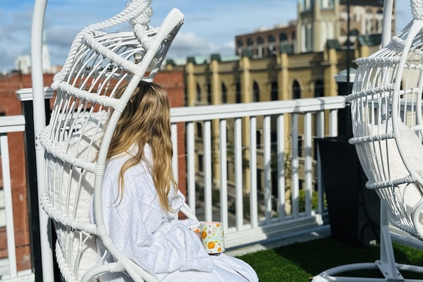 Grab a provided plush robe and enjoy sipping your morning coffee.