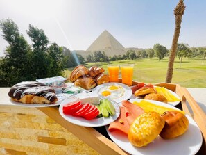 Outdoor dining - Best view directly to the great pyramids and golf garden  (Giza Governorate)