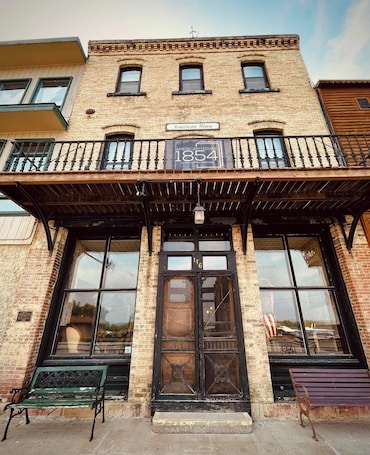 Exterior detail. American House 1854- Stagecoach Stop Suite, 2 Bedrooms, Kitchenette, Sleeps 6