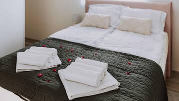 4 dormitorios, caja fuerte, tabla de planchar con plancha