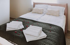 4 bedrooms, in-room safe, iron/ironing board, travel cot