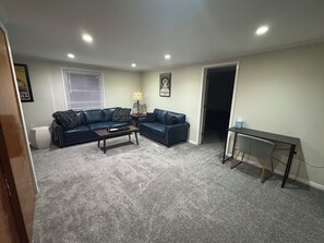 Living area - Updated Lakewood hideaway with big screen TV. Family friendly.  (Lakewood)