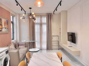 Design Double Room | Living area | Smart TV - Meta Home Apartment - Vinhomes Imperia (Hai Phong)