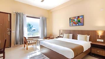 Chambre Deluxe | Mini-bar avec articles gratuits, coffres-forts dans les chambres