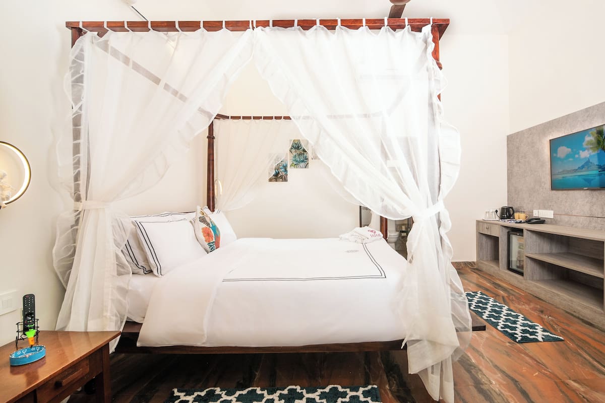 Premium bedding, memory foam beds, minibar, desk