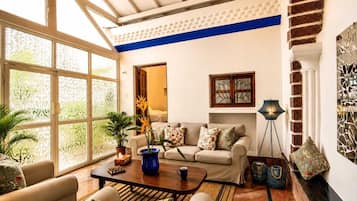 Vintage Family Suite | Living area | 56-inch TV with digital channels, Netflix, streaming services