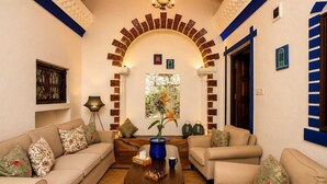 Vintage Family Suite | Living area | 56-inch TV with digital channels, Netflix, streaming services - Sashas Holiday Village (Vagator)