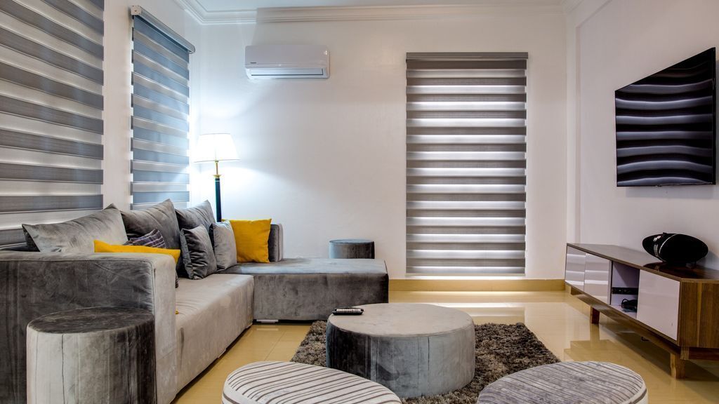 Two Bedroom Apartment | Living area | 52-inch TV with satellite channels