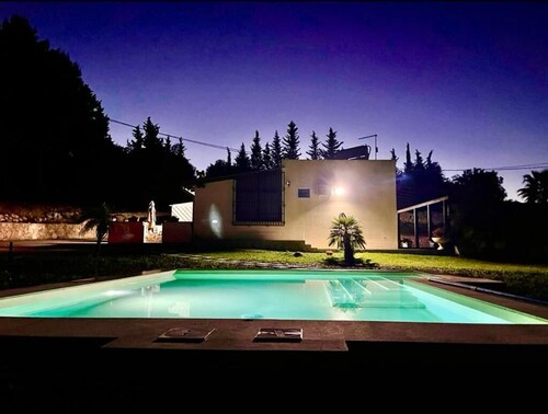 Strelitzia house with heated swimming pool from December 2024 and garden   