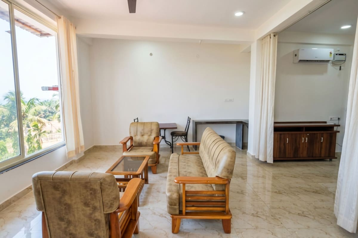 Exclusive Apartment | Living area | 32-inch LCD TV with cable channels