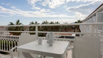 Basic Studio, Pool View, Tower | Balcony view