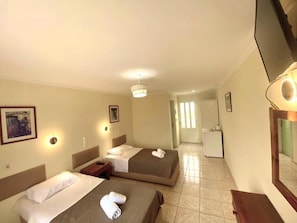 Basic Double or Twin Room, Pool View, Tower | In-room safe, iron/ironing board, free WiFi, bed sheets
