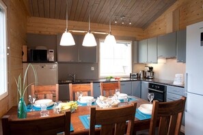 Villa, Ensuite, Beachside | Private kitchen | Electric kettle, highchair - Villa Hapero (Mikkeli)