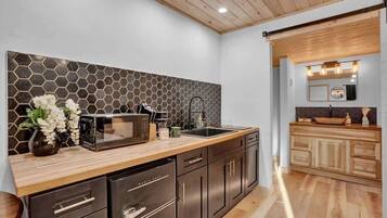 Fridge, microwave, stovetop, coffee/tea maker