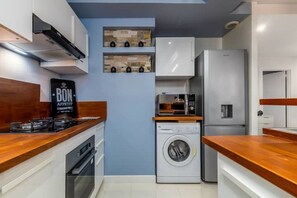 Fridge, microwave, oven, cookware/dishes/utensils