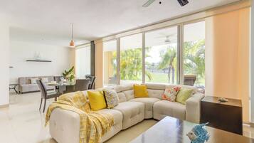 Executive Apartment, Balcony, Golf View | Living area | Flat-screen TV