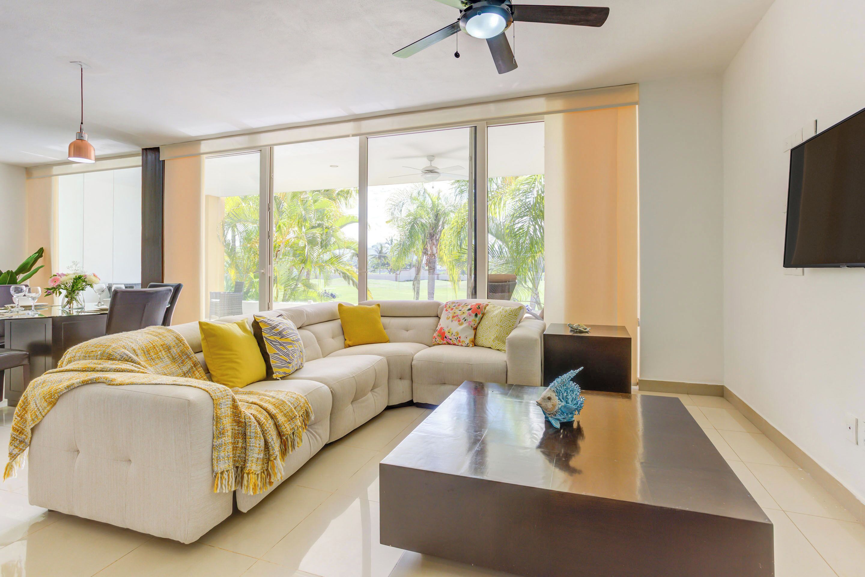 Executive Apartment, Balcony, Golf View | Living area | Flat-screen TV