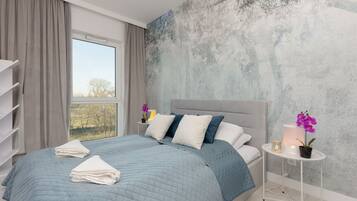 Apartment, 1 Bedroom, Balcony | 1 bedroom, laptop workspace, bed sheets