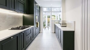 Casa básica, varias camas | Cocina privada
