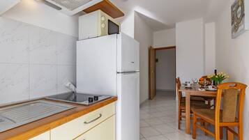 Apartment | Eigene Küche | Kühlschrank, Mikrowelle, Herdplatte, Geschirrspüler
