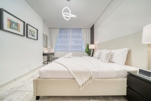 1 chambre, coffre-fort, fer et planche à repasser