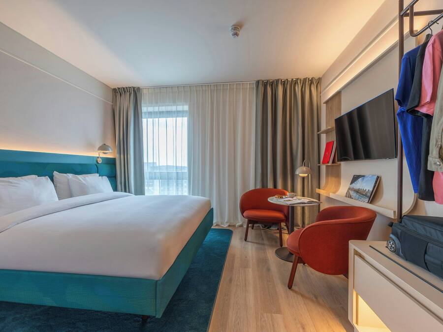 Deluxe Studio (Disability Access) | Desk, laptop workspace, blackout curtains, soundproofing