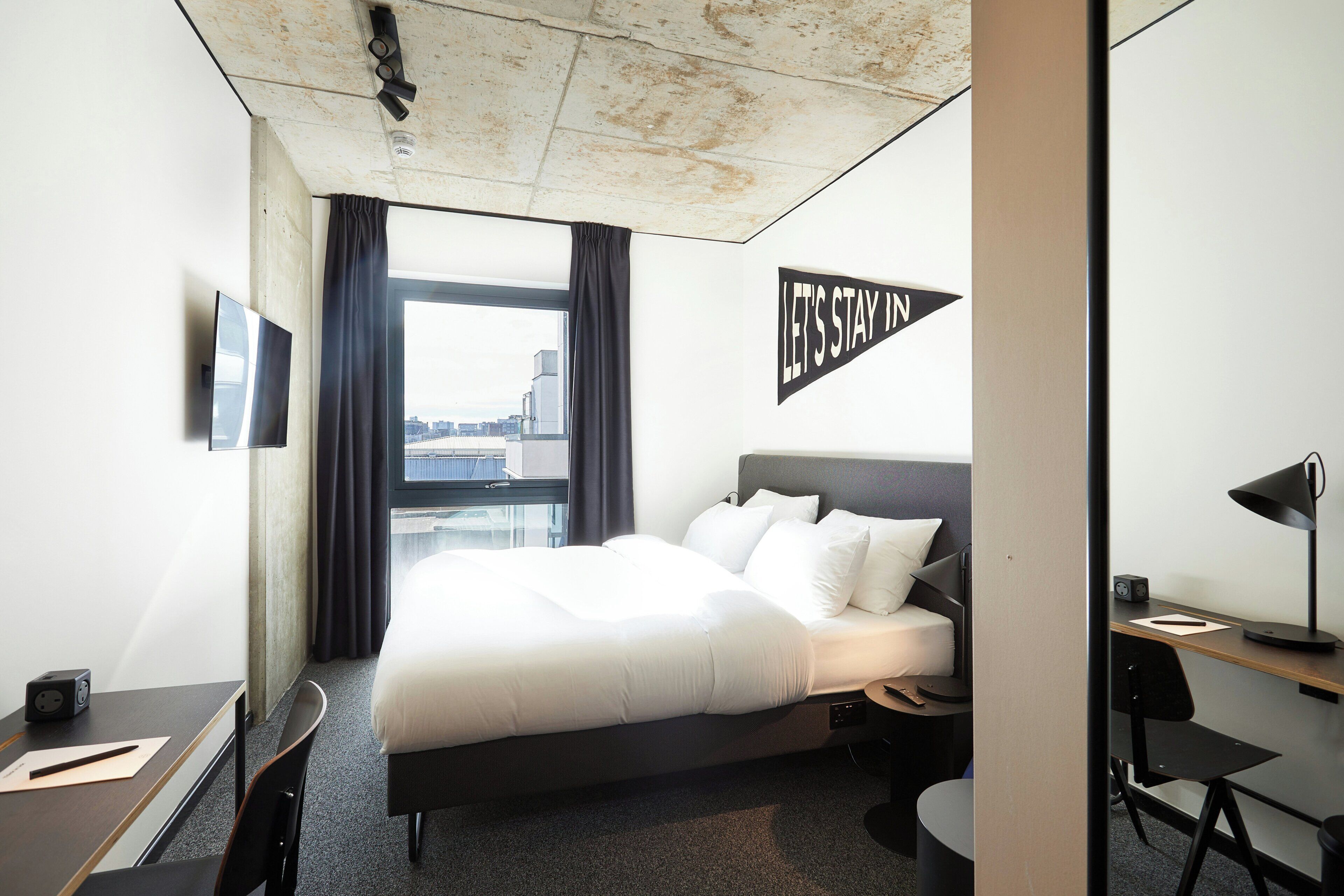 Desk, laptop workspace, blackout curtains, free WiFi