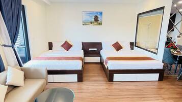 Superior Apartment, Multiple Beds, Balcony, Beach View | Premium bedding, pillowtop beds, individually decorated