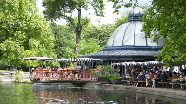 A park with a pond, ducks, a boat, and a gazebo. - The Railway Tavern Hotel (London)