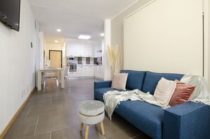 Comfort Apartment, 1 Bedroom | Living area | 30-inch flat-screen TV with cable channels - Smeralda Flats (Olbia)