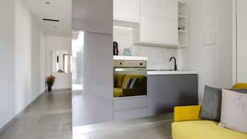 Business Apartment, 1 Bedroom, Patio, Courtyard Area | Private kitchen | Full-sized fridge, oven, stovetop, espresso maker
