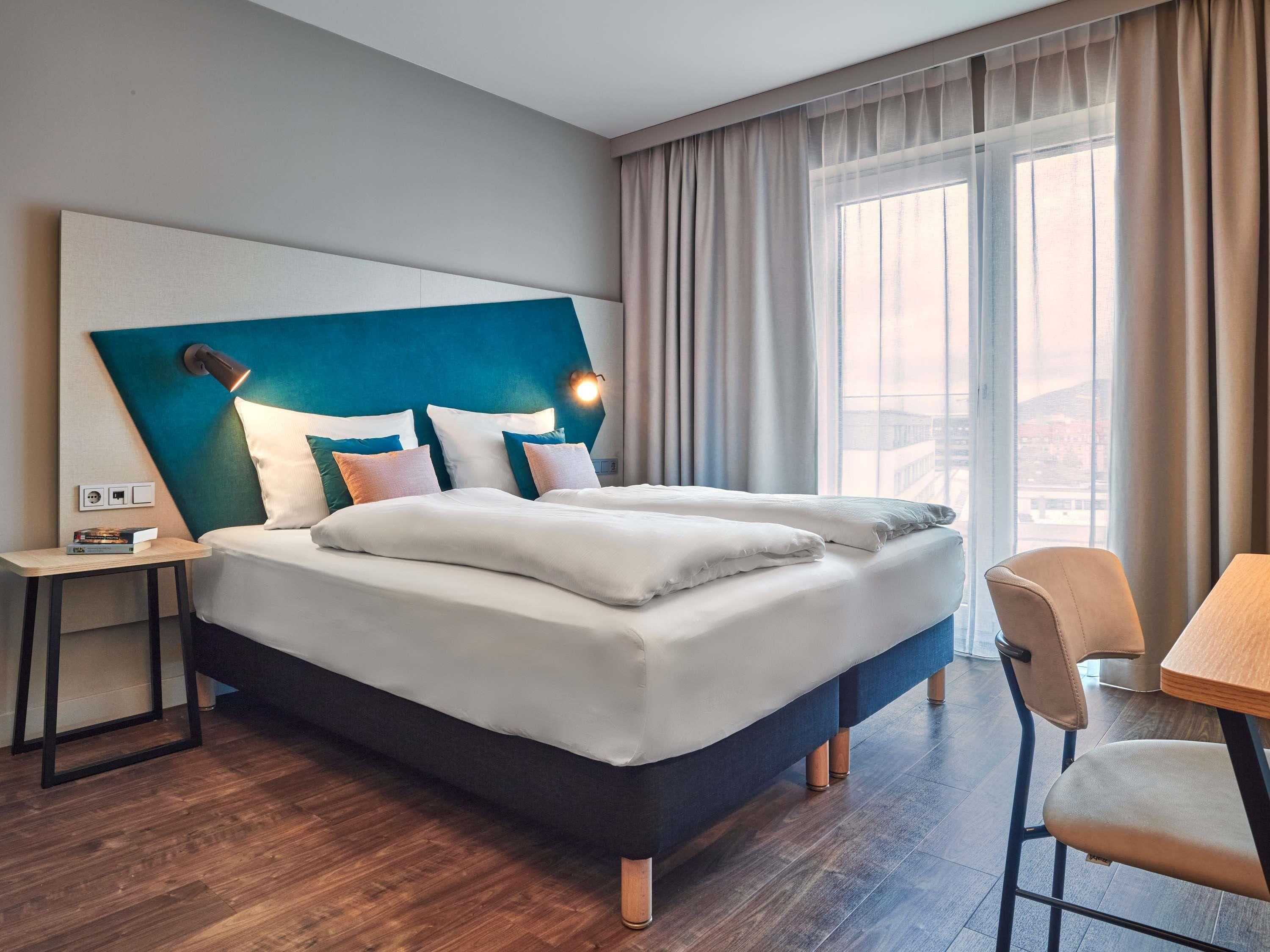 Hypo-allergenic bedding available, in-room safe, desk, laptop workspace