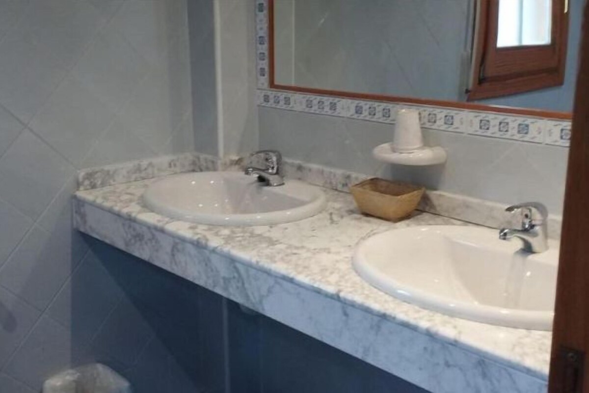 Bidet, towels, soap, shampoo