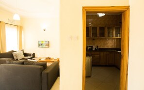 Smart TV - "Embrace Arusha's charm at Medan Hotel & Apartment: Your Ideal Stay!" (Arusha, Tanzania)