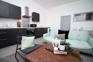 ซิตี้อพาร์ทเมนท์ | บริเวณนั่งเล่น | ทีวีจอแบน