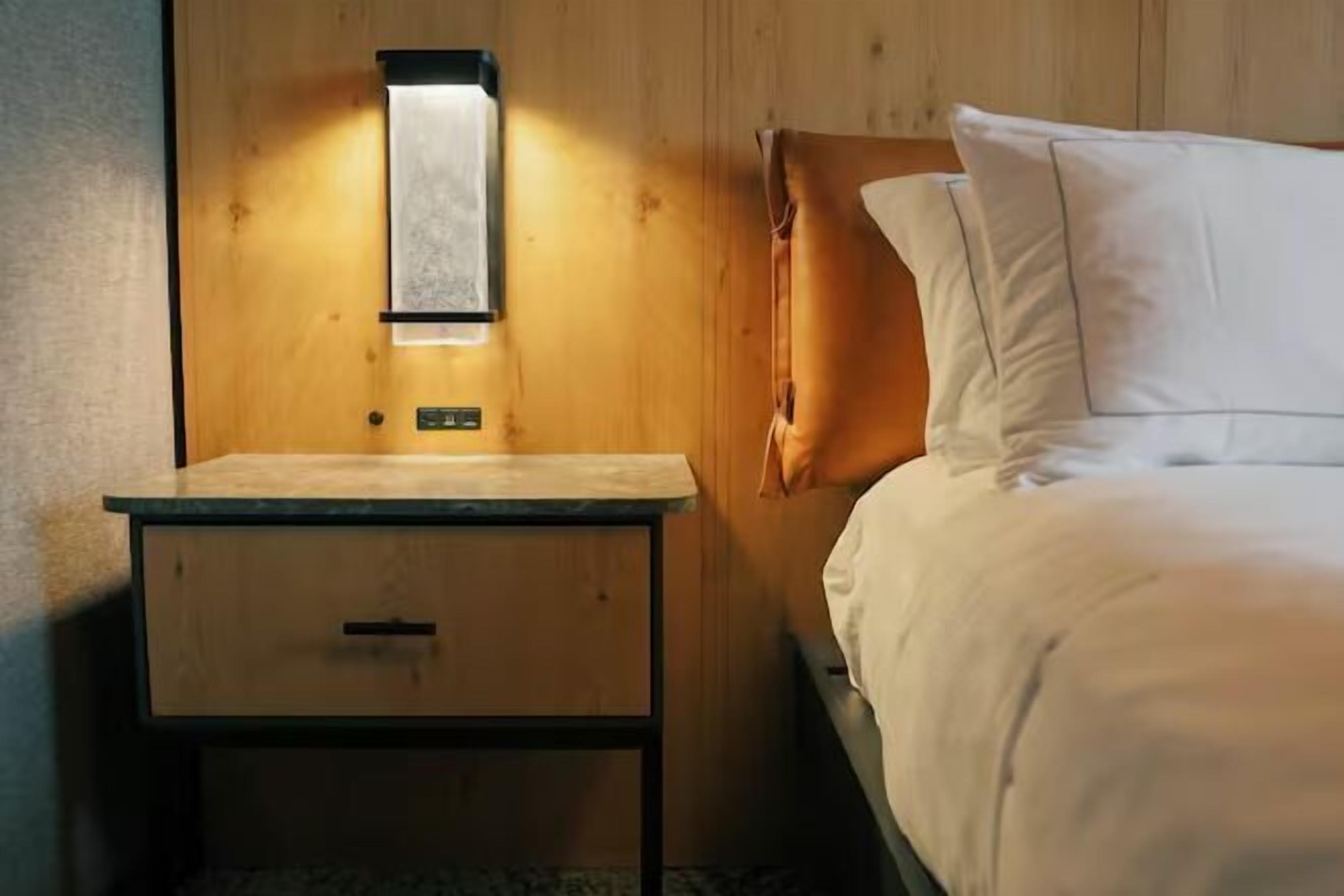 Premium bedding, down comforters, pillowtop beds, in-room safe