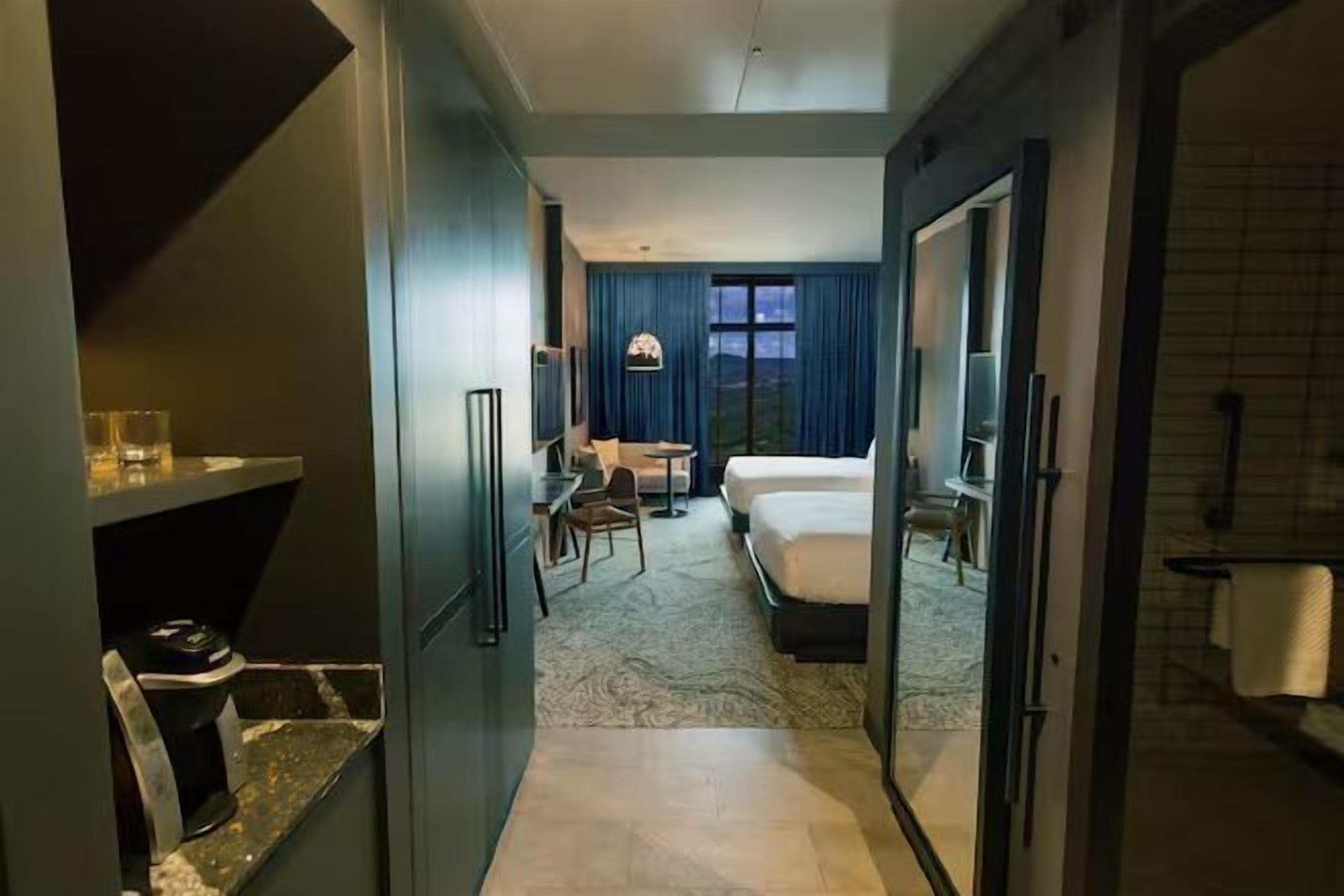 Premium bedding, down comforters, pillowtop beds, in-room safe