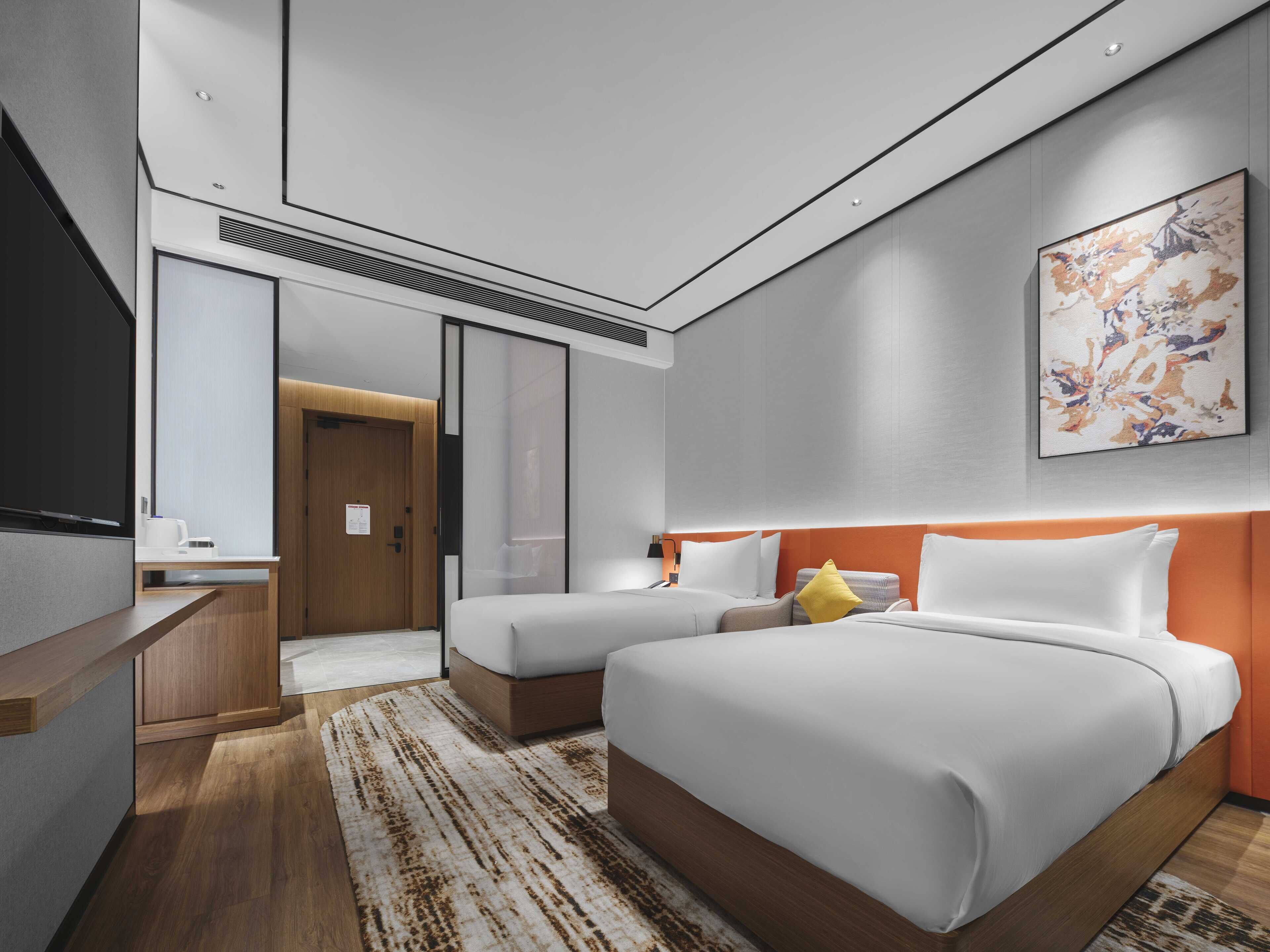 Deluxe Room, 2 Twin Beds | Down comforters, free minibar items, in-room safe, desk