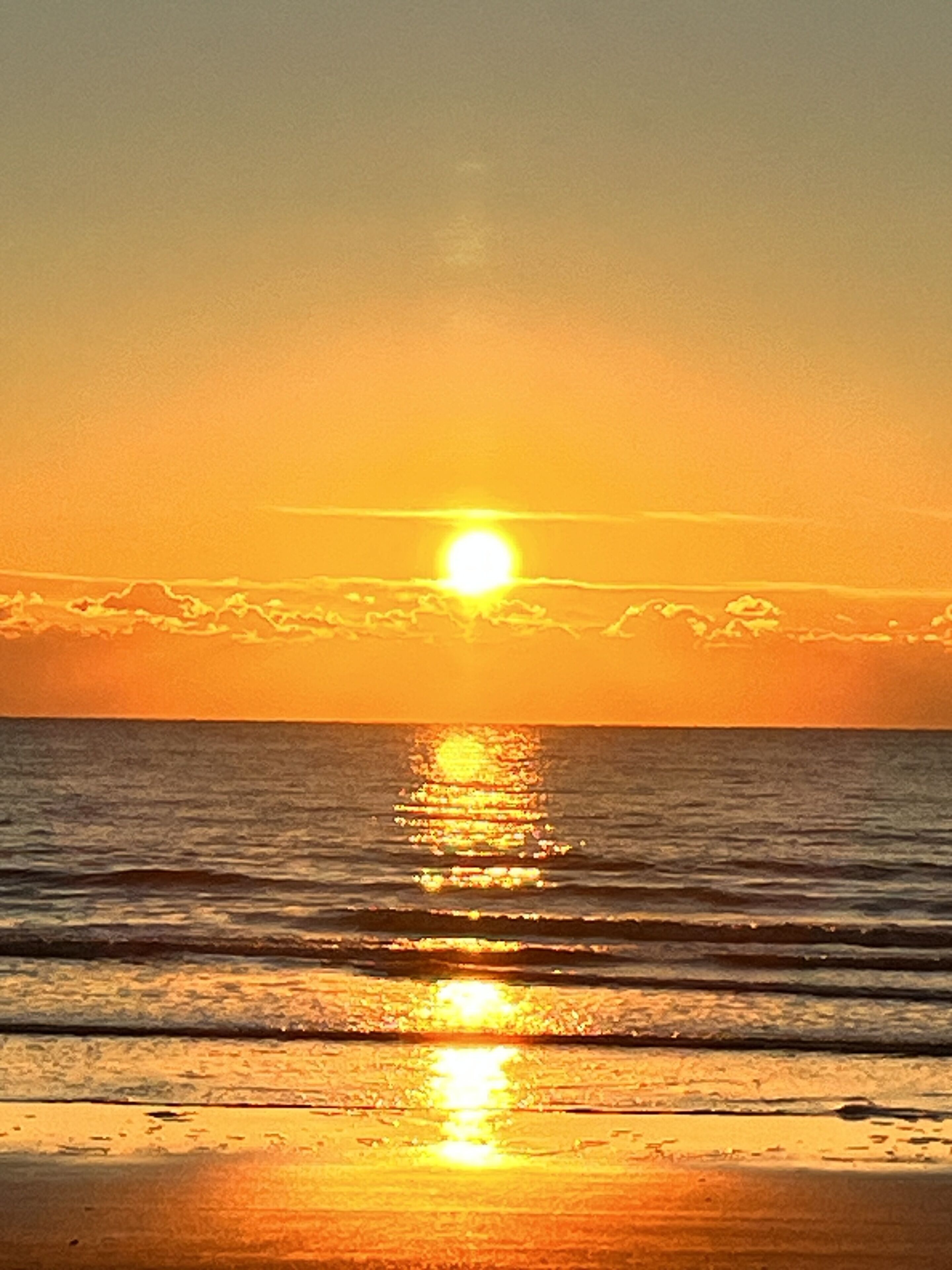 Ligstoelen aan het strand