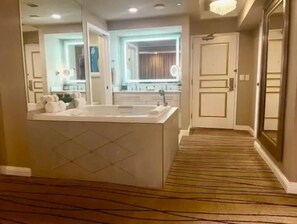 Jetted bath, hair dryer, towels, soap