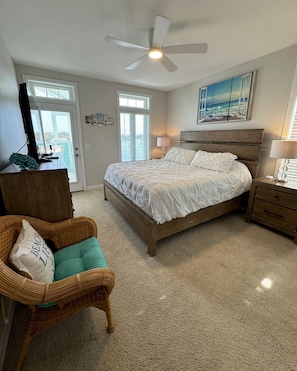 Primary Bedroom, with door to Balcony. - Blue Crab Condo at Rivers Edge (Steinhatchee)