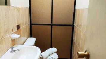 Shower, hair dryer, towels, soap