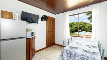 Family Apartment | Living area | 32-inch Smart TV with cable channels