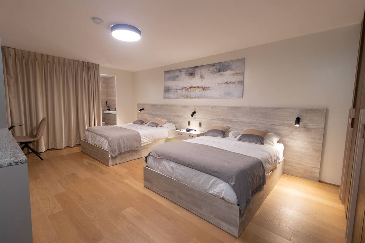 SUITE UNION | Pillowtop beds, minibar, in-room safe, blackout drapes