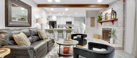 Smart TV, fireplace, books