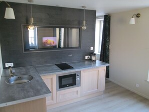 Fridge, stovetop, electric kettle, toaster